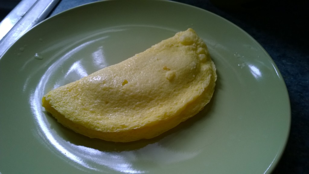 This is one of the breakfast options- it comes frozen, all you do is heat it up.  Done!  This is a turkey, ham, and cheese omelet, and it's quite good. 